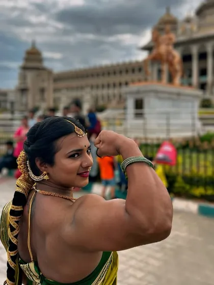 As a proud Kannadathi, posing in a traditional saree in front of the Vidhana Soudha in Bengaluru is a powerful statement. It represents my deep connection to my roots and my belief in celebrating our culture with strength.
