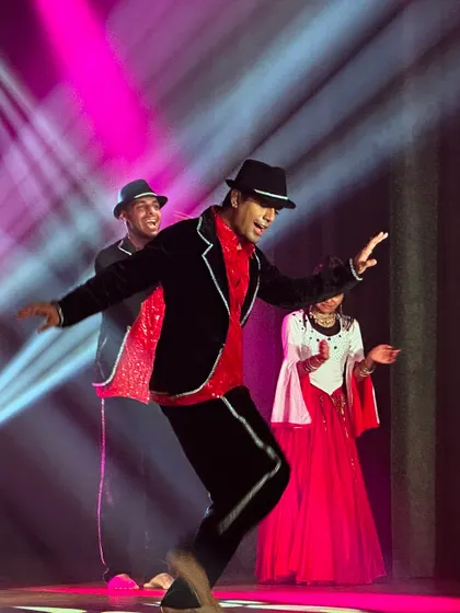 A classic, stylish performance perfect for a wedding reception. We blend timeless Bollywood charm with modern stage presence, complete with costumes like fedoras and jackets to fit your theme.
