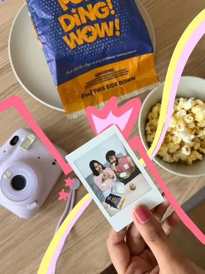 A cozy movie moment at home, with a polaroid and some popcorn. The doodles make it feel like a scrapbook page.