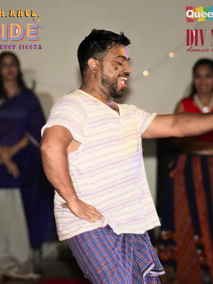 A fun, candid moment of a dancer enjoying the 'Naach.Khel.Pride' party. It's all about letting loose and being yourself.