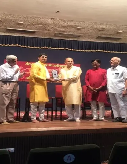 On stage during a felicitation ceremony at a concert in Pune.
