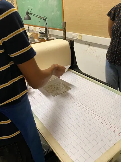 The final step in the printmaking process: pulling the print. This moment of reveal is always one of anticipation, where the image is transferred from the plate to the paper.