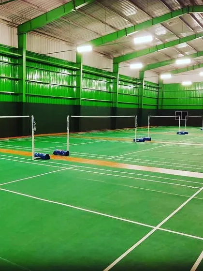 A clear view of my well-lit, spacious courts. The high-quality Li-Ning synthetic surfaces and 31-foot ceilings provide a professional playing experience for everyone, from beginners to seasoned players.