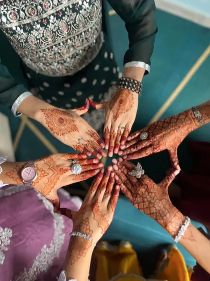 A fun group shot showing different henna designs. It's always a joy to apply mehndi for friends and family during celebrations.