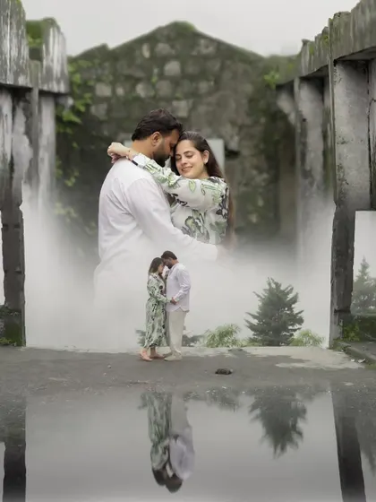 A creative double-exposure pre-wedding photograph combining an intimate embrace with a misty, rustic location, reflecting the couple's deep connection and the atmosphere of their chosen destination.