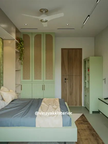 Here you can see the full layout, including the matching olive-green TV console and storage cabinet. We ensure every piece of furniture is cohesive, creating a harmonious and well-planned space.