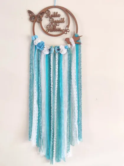 "Embrace transformation as gracefully as a butterfly." This custom name dreamcatcher features delicate butterfly and bird cutouts, adding a touch of nature-inspired whimsy.