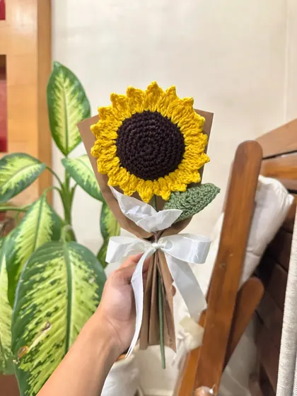 Our single crochet sunflower, simply wrapped and ready to brighten someone's day. It's a perfect, affordable way to show you care with a flower that will last forever.
