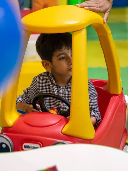Cruising in style in the classic red and yellow coupe. Our ride-on toys are perfect for little drivers to navigate the play area.