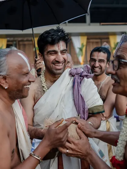 The groom's joyful arrival. We capture the energy and happiness of these traditional moments, preserving the excitement of the wedding day.