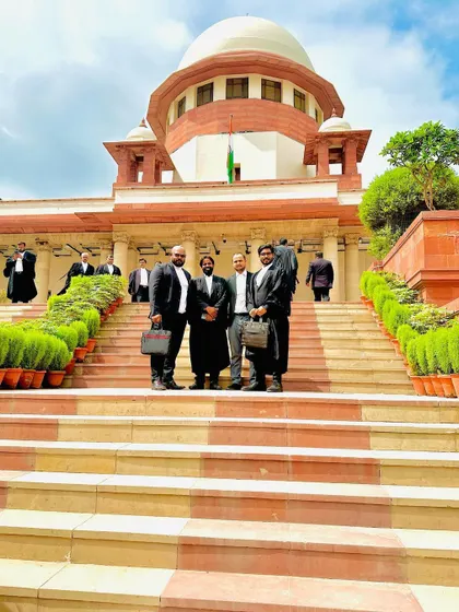 My team, standing strong on the steps of the Supreme Court of India.