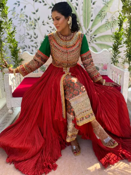 A textured ponytail is a fantastic choice for a vibrant event like a Mehendi. I created this look with lots of volume and movement, and finished it with a stunning chained earring accessory.