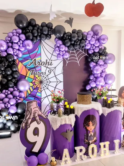 A spooky and stylish Wednesday Addams themed 9th birthday party.