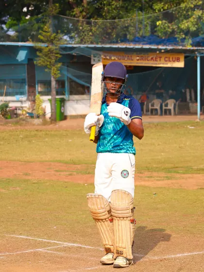 A player ready at the crease, warming up for the T20 President's Cup challenge.