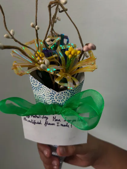 A lovely handmade bouquet, a perfect gift from a child to their mother. It's the love and effort that goes into it that makes it priceless.