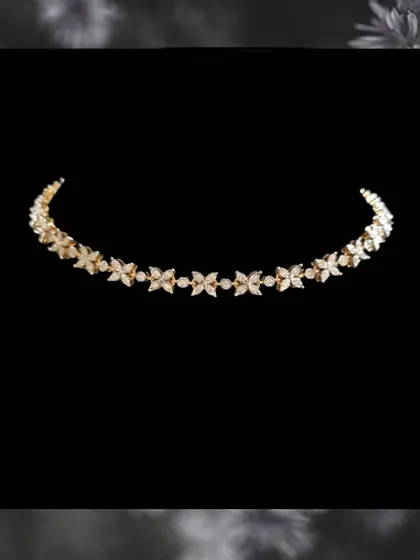 A delicate and budget-friendly diamond necklace with a floral-inspired design. This piece offers the look of real diamonds in a light, wearable, and affordable style.
