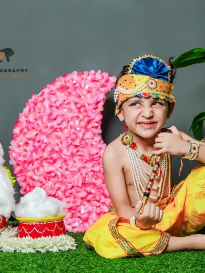 Our Janmashtami themed shoots are popular for kids of all ages. This boy's playful pose and expression perfectly capture the mischievous spirit of Lord Krishna.