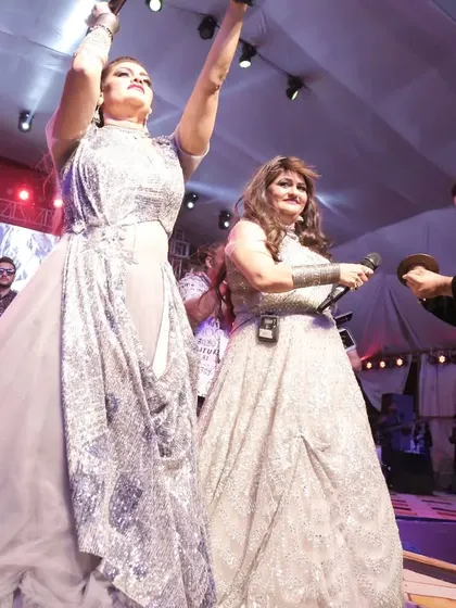 Sharing a fun moment on stage with one of our guests. Our shows are always interactive and spontaneous.