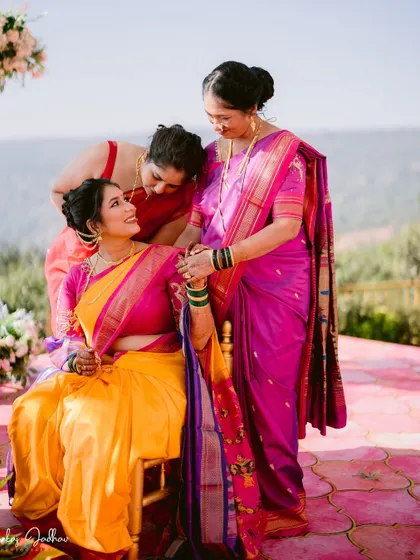 A touching moment between the bride and her family members.