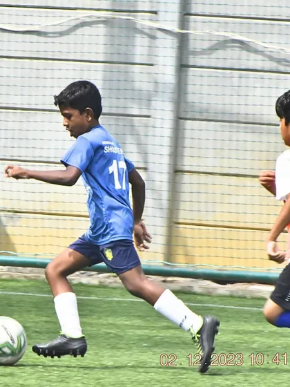 Celebrating our U-9 team's championship win at the Mega International Football Tournament. These moments of victory are what our young athletes train for.