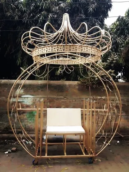 A fairytale entrance carriage prop. This piece is perfect for making a Cinderella-style entrance that will leave guests in awe.