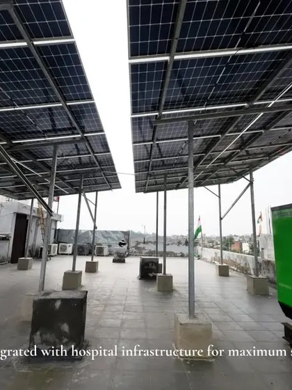 This perspective shows how our solar panel installation integrates with existing hospital infrastructure, including a backup generator, for seamless energy management.