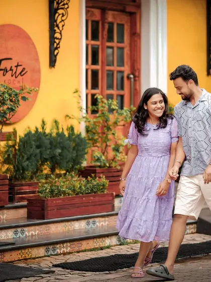 A candid walking shot capturing genuine smiles and movement, making the photos feel alive and natural.