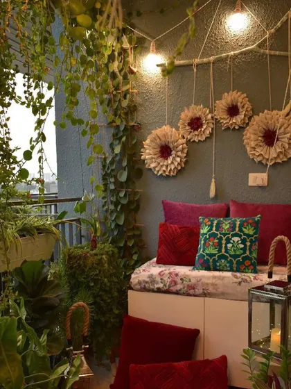 Another look for my balcony, this time with a more bohemian vibe. The DIY flower wall art and plush cushions make it a cozy retreat.