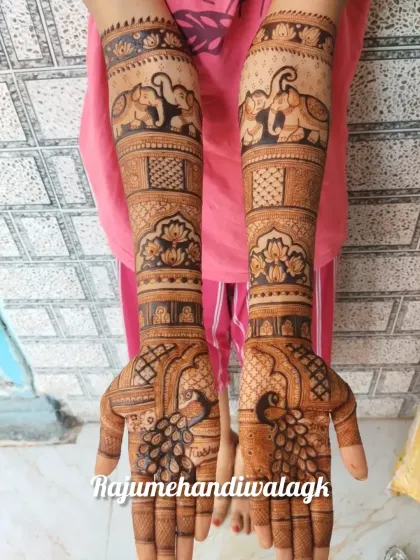 This design is similar to the previous one, showcasing the popular combination of elephants and peacocks in my traditional bridal work.