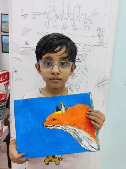 More images of our dedicated young artists at work and proudly displaying their creations.