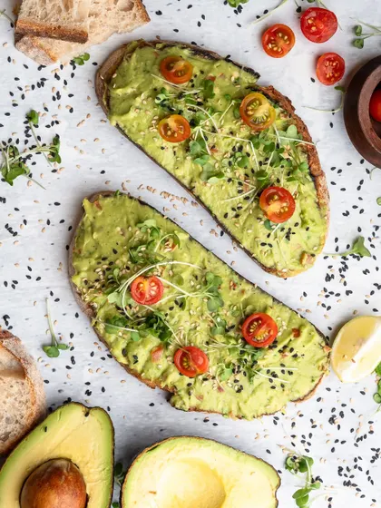 Fresh, simple, and vibrant. This overhead shot of avocado toast highlights the fresh ingredients and beautiful colors, making a simple dish look like a must-try menu item.