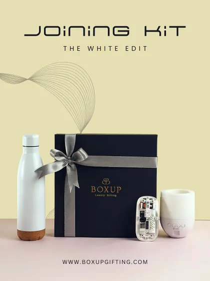 The White Edit is a clean and modern joining kit for new employees. It features a white water bottle, a multi-connector charger, and a humidifier, blending style with high utility.