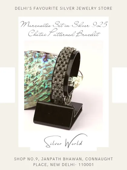 This unique bracelet features a 'chatai' or woven mat pattern, set with sparkling Swiss marcasites in 92.5 silver. It's a statement piece that blends traditional patterns with vintage glamour.