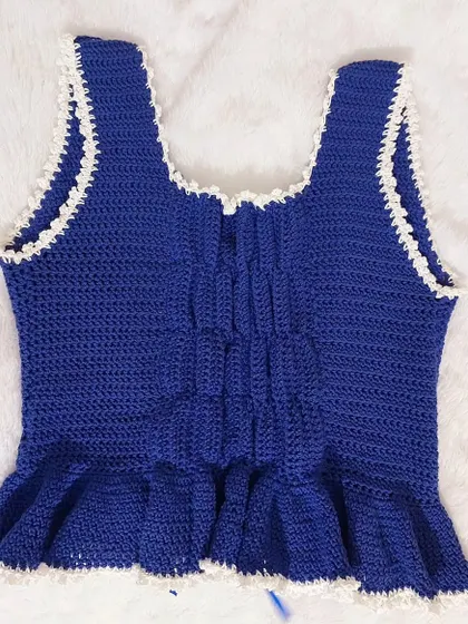 A close-up of the ruched back panel on the Olivia Top, a detail that provides excellent fit and comfort.