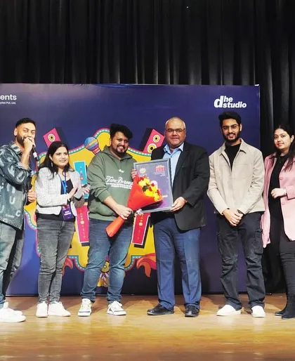 A group photo with my mentor and the event team. Collaboration and mentorship are a huge part of my journey.