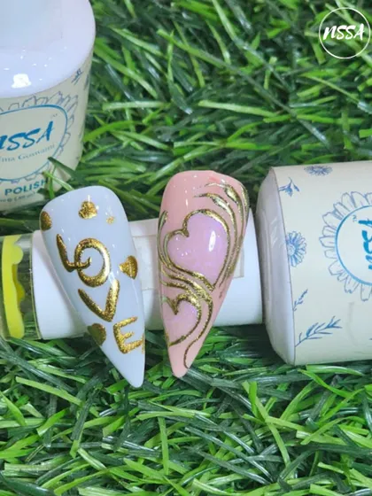 An elegant Valentine's set featuring "LOVE" in gold chrome and a hand-painted heart design. A sophisticated way to show some love.