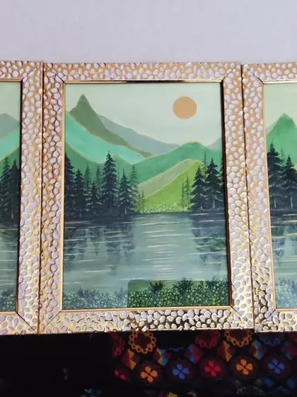 Another angle of my framed "The Divine Nature" triptych. The textured gold frame complements the green and earthy tones of the landscape paintings.