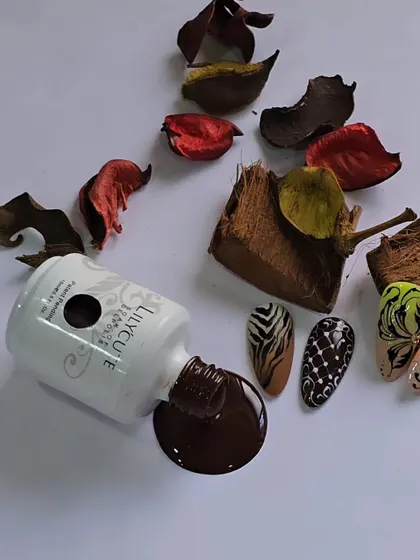 The rich brown from the Lilycute gel polish collection. The consistency is perfect for creating clean lines and even coverage, which is essential for detailed nail art.