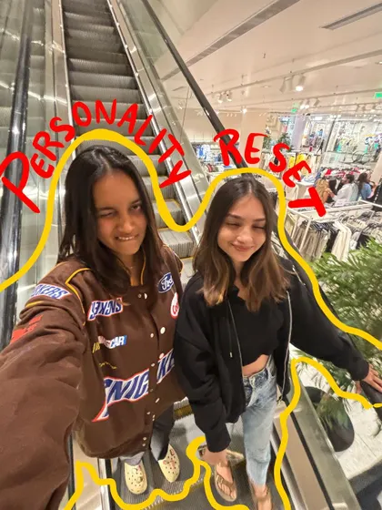 Personality reset with my friend. The yellow doodle connects us in this fun escalator selfie.