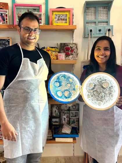 This couple had a great time creating their own unique moon lamps. One chose a classic grey moon, while the other went for a cool blue, showing the endless possibilities for customization.