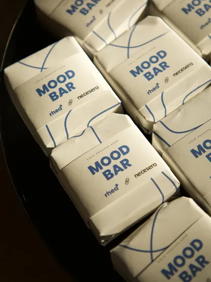 The "Mood Bar" soaps laid out, showcasing the consistent and professional branding for this corporate collaboration.