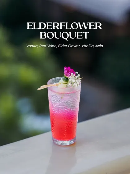 I carry a bit of spring in my soul. As an ode to that cheerful spirit, I craft the Elderflower Bouquet, a cocktail that brings together smooth vodka, a smidge of vanilla, red wine, and elderflower. It breathes life into every occasion.