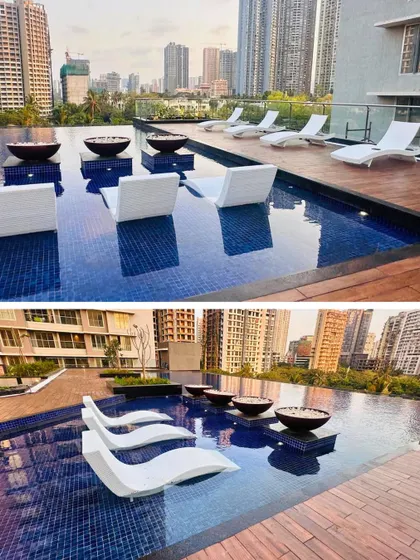The poolside lounge chairs at the completed Ekta Tripolis residential tower in Goregaon. The design of the amenity deck focuses on luxury and relaxation, creating a resort-like feel within the city.