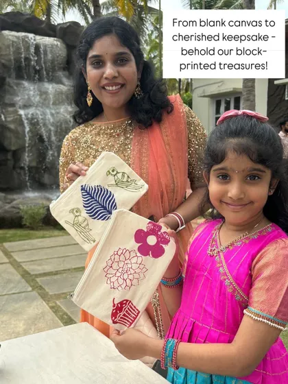 From a blank canvas to a cherished keepsake. A mother and daughter proudly show off the beautiful pouches they designed and printed themselves at a wedding. It's so rewarding to see the pride and happiness on their faces.