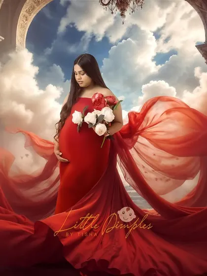 A truly epic and creative portrait. We combined a stunning red gown with a fantasy background to create a piece of art that is both powerful and beautiful.
