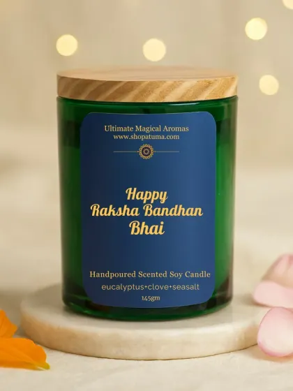 The 'Happy Raksha Bandhan Bhai' candle in a green jar. This one features a more masculine scent profile of eucalyptus, clove, and sea salt.