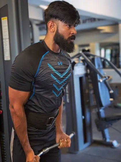 "Strength is the product of struggle." A straight bar curl, showcasing the vascularity and muscle maturity in my arms.