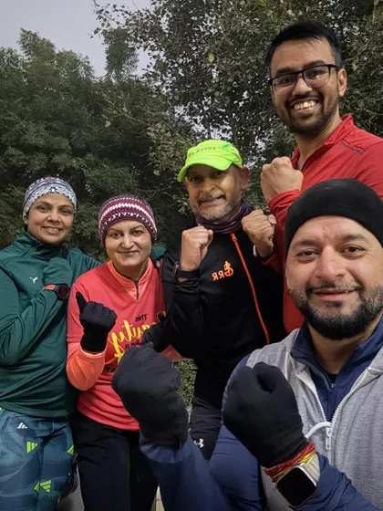 A selfie of a group of our runners, bundled up against the cold but with spirits high.