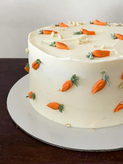 Getting ready for Easter with these adorable carrot cakes. I offer different styles, from a simple cake decorated with tiny piped carrots to a more rustic version with dollops of cream cheese frosting.