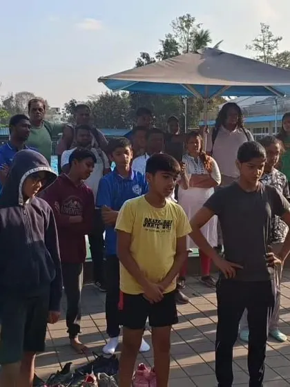 A group of our younger swimmers listening intently during a dry land training session. We instill the importance of fitness outside the pool from a very early age.